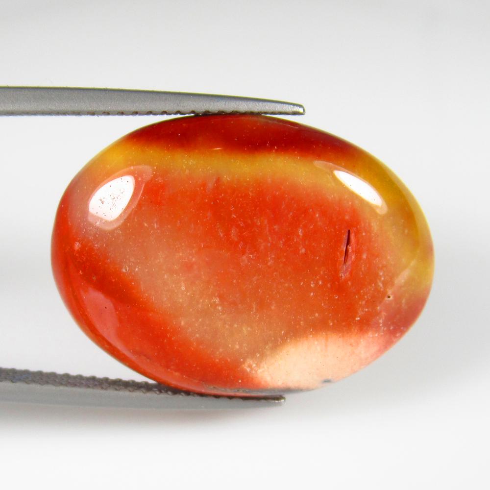 Natural Jasper Quartz - 18.97 Ct: No Reserve! Title: Natural Jasper Quartz - 18.97 Ct Origin: Brazil Weight: 18.97 Size/Dimensions: 25.0 x 18.5 x 6.1 mm Additional Information: Pieces : 1 No's / Shape : Oval Cabochon / Color : Orange
