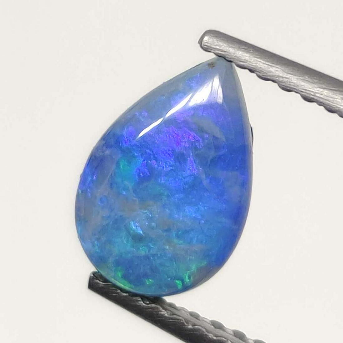 1 Ct Australian Doublet Opal: No Reserve! Title: 1 Ct Australian Doublet Opal Additional Information: Gemstones: Australian Doublet Opal Carat Weights: 1 ct Size/Dimensions: 9 X 6 mm Materials Techniques: Doublet Opal Shipping: Do
