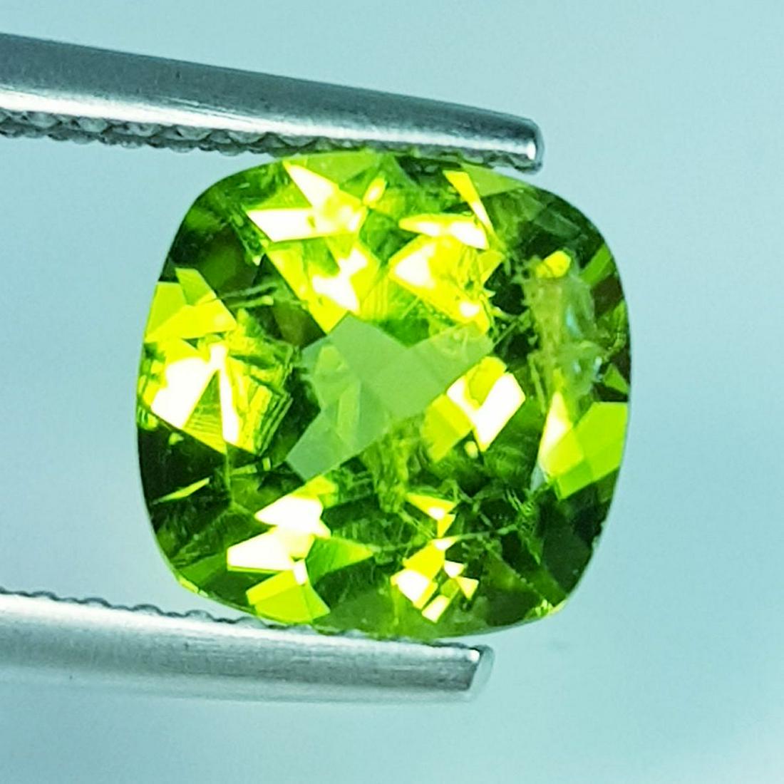 2.35 ctz " Stunning Green " Natural Pakistan Peridot: No Reserve! Title: 2.35 ctz " Stunning Green " Natural Pakistan Peridot Color/Clarity: Green / VVS Gemstones: Peridot Carat Weights: 2.35 Size/Dimensions: 8.20 x 8.10 x4.80 Additional Information: Cus