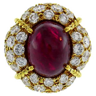 Van Cleef & Arpels Burmese Ruby Diamond Gold Ring, 1985: Title: Van Cleef & Arpels Burmese Ruby Diamond Gold Ring, 1985Description: Stunning and chic cocktail ring created by Van Cleef & Arpels in France in 1985. Features an approximately 8.86-carat oval