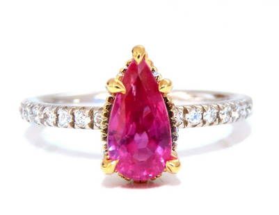 AIGS certified 1.45ct No Heat Ruby Ring 14kt raised mod deck: AIGS certified pear shape ruby ring.No heat ruby, red-pink color.9.2x4.6 mm..45ct natural side round diamonds.G-color, vs2-clarity14 karat white goldDepth of ring 7 mmSize 4.75, we may resize.2.4