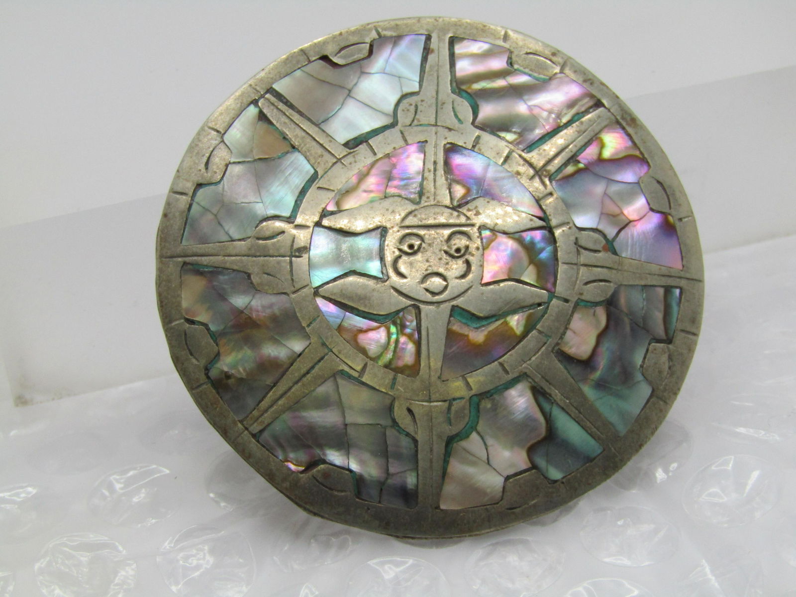 Vintage Silver Mexican Sun Brooch/Pendant, Inlaid Abalone, 2.5", 1950's-1970's: Vintage Silver Mexican Sun Brooch/Pendant, Inlaid Abalone, 2.5", 1950's-1970's. Vintage Silver Mexican Sun Brooch/Pendant, Inlaid Abalone, 2.5", 1950's. It is marked Sterlin, Mexico and 925. It is sli