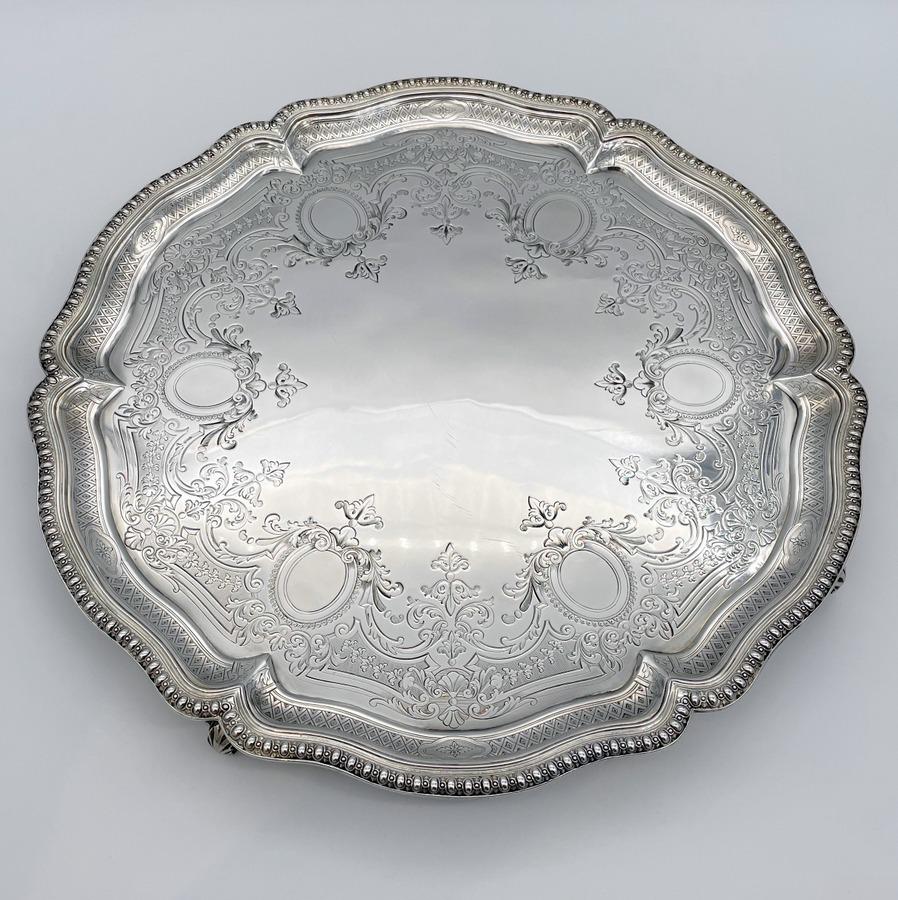 19th Century Antique Victorian Sterling Silver Large Salver London 1881 Robert Garrard: Title: 19th Century Antique Victorian Sterling Silver Large Salver London 1881 Robert Garrard Description: A truly magnificent bead border large shaped circular silver salver decorated with superb flo