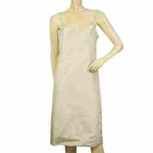 Donna Karan Collection Off White Silk Sequined Knee Length Dress size 44: Donna Karan Collection Off White Silk Sequined Knee Length Dress size 44 This lovely dress by Donna Karan, is a knee length off white silky dress that it is partly covered by sequins with thin spaghet