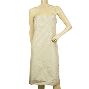 Donna Karan Collection Off White Silk Sequined Knee Length Dress size 44: Donna Karan Collection Off White Silk Sequined Knee Length Dress size 44 This lovely dress by Donna Karan, is a knee length off white silky dress that it is partly covered by sequins with thin spaghet