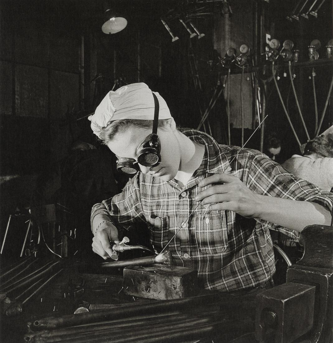 SAM SHAW - Woman At Work During World War II, 1944: Artist: Sam Shaw Title: Woman At Work During World War II At The Bazooka Factory, 1944 Medium: Photo Litho, 2010, Germany Dimensions: 7.5x7.75" Description: Heat Wax Mounted on 11x14" Conservation Boa