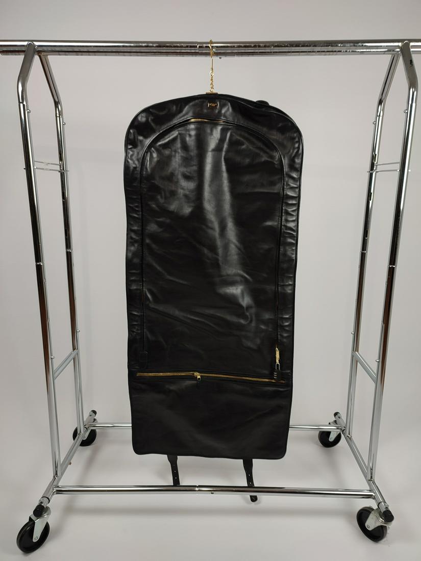 ITALIAN ASCOLI LEATHER SUIT CARRIER: Title: ITALIAN ASCOLI LEATHER SUIT CARRIER Description: Contains strap and front pocket; Length open: 135cm, 53.14in; lenth folded: 60 cm; 23.62in; Width: 50cm, 19.68in; Additional Information: We off