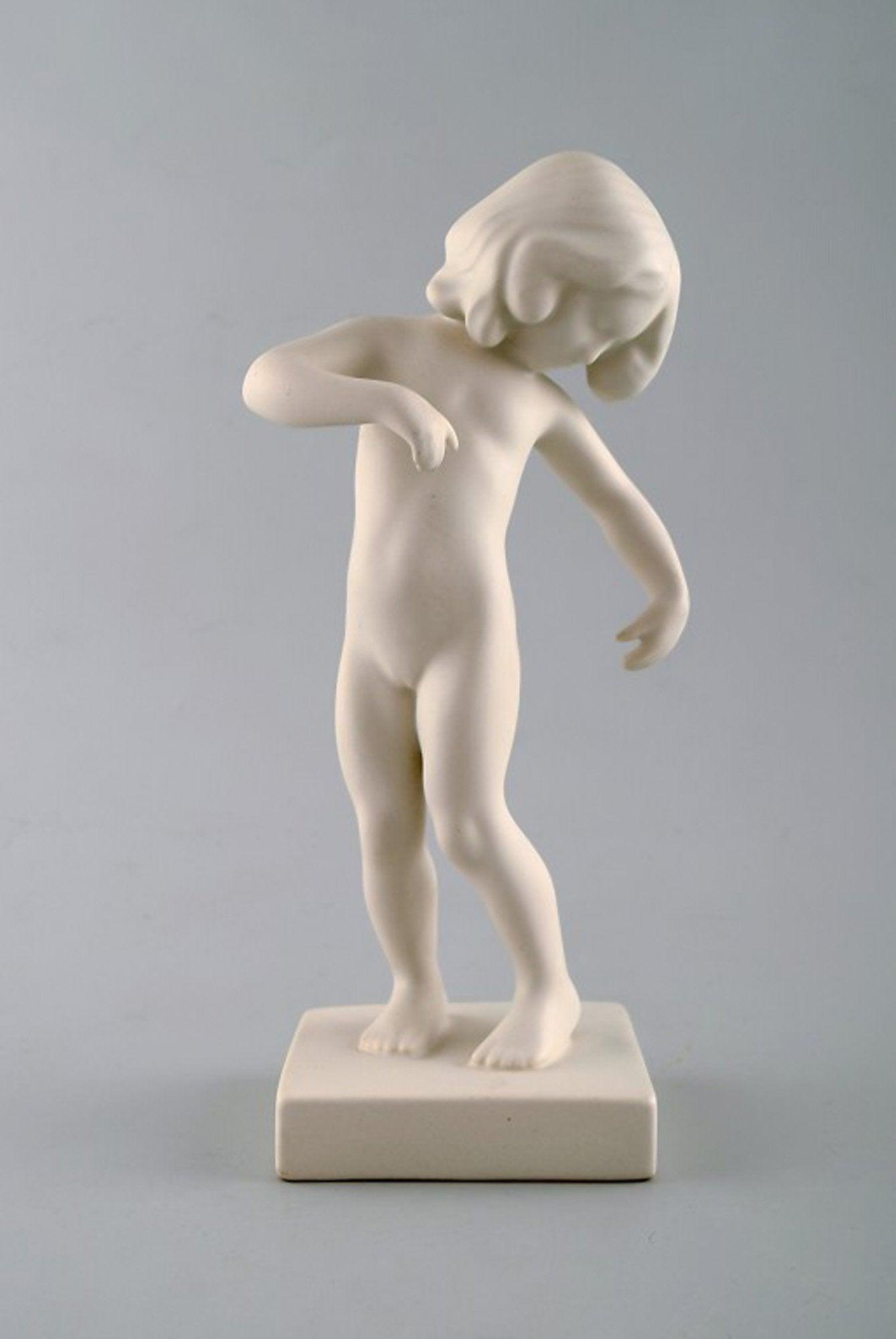 P. Ipsen's, Denmark. Girl no. 888. In rare white glaze. Venus Kalipygos, Design Kai Nielsen.: P. Ipsen's, Denmark. Girl no. 888. In rare white glaze. Venus Kalipygos, Design Kai Nielsen. 1940'erne. Measures: 22,2 x 10,5 cm. Denmark, app. 1940 s. In perfect condition. Reserve: $280.00 Shipping: