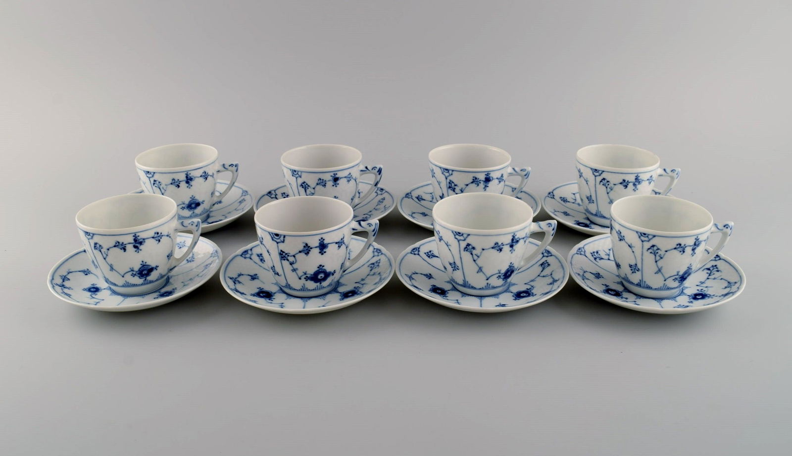 Eight Bing & Grøndahl blue fluted coffee cups with saucers. Model number 305. Mid 20th century. (1 of 6)