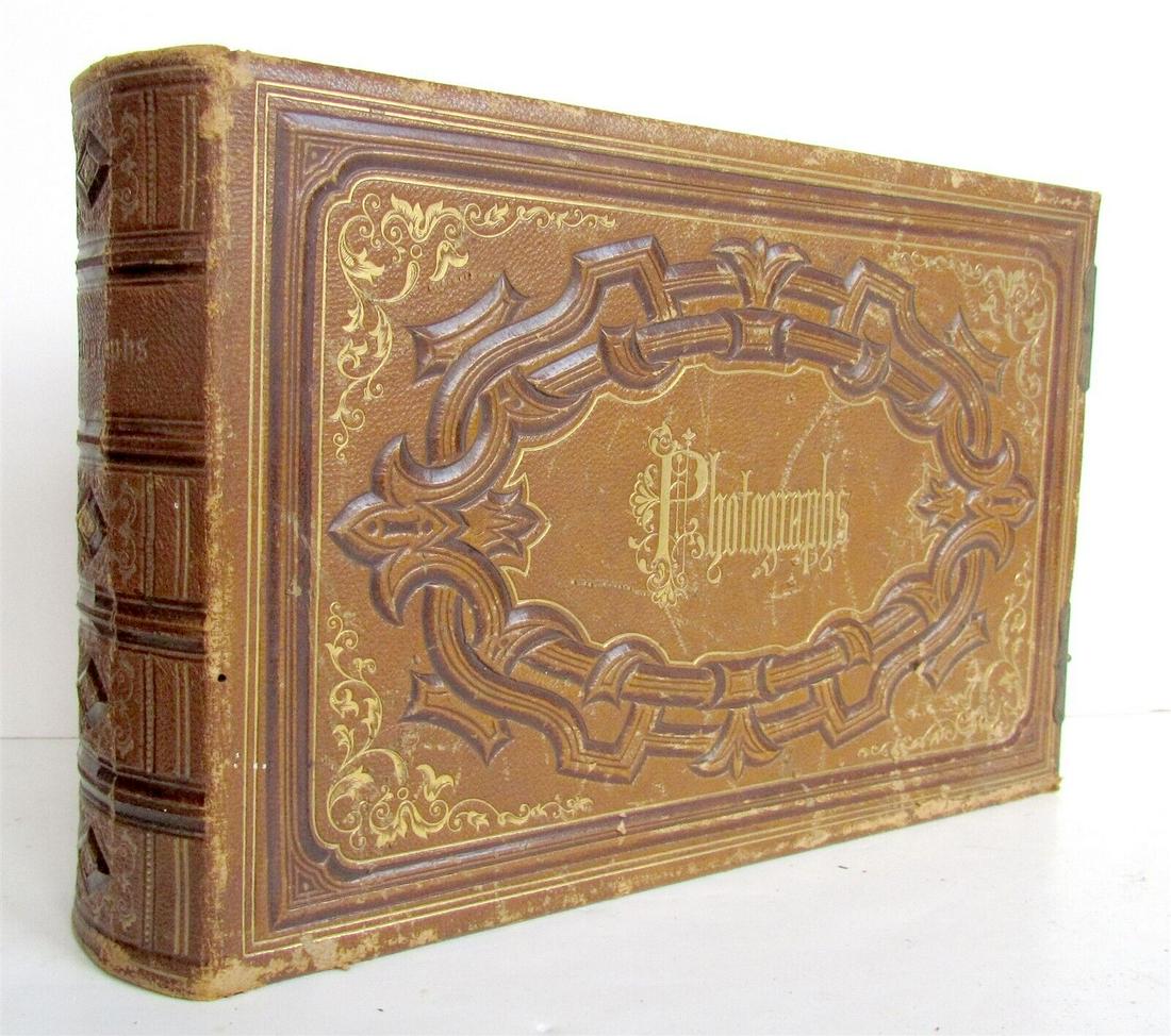 PHOTO ALBUM VICTORIAN antique leather bound w/ clasps: Size 6 by 9" Leather bound, with intact clasps. Gilt edge. Very good condition interior, worn leather. Reserve: $55.00 Shipping: Domestic: Flat-rate of $25.00 to anywhere within the contiguous U.S. I
