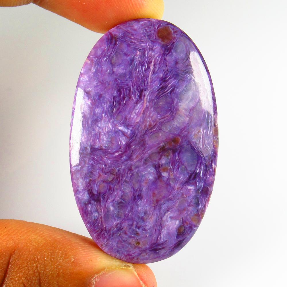 Natural Lalimar Jasper - 68.52 Ct: No Reserve! Title: Natural Lalimar Jasper - 68.52 Ct Origin: Brazil Weight: 68.52 Size/Dimensions: 45.0 x 28.0 x 6.30 mm Additional Information: Pieces : 1 No's / Shape : Oval Cab / Clarity Opaque / T