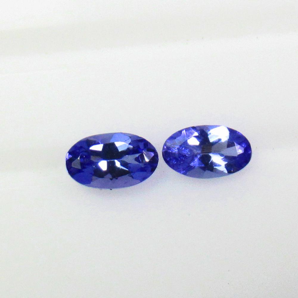 0.40 Ctw Natural Tanzanite Oval Pair: No Reserve! Title: 0.40 Ctw Natural Tanzanite Oval Pair Stone Clarity: VVS Gemstones: Natural Tanzanite Carat Weights: 0.4 Size/Dimensions: 5.00 x 3.00 x 2.10 mm / 2 P'cs Additional Information: Top Q