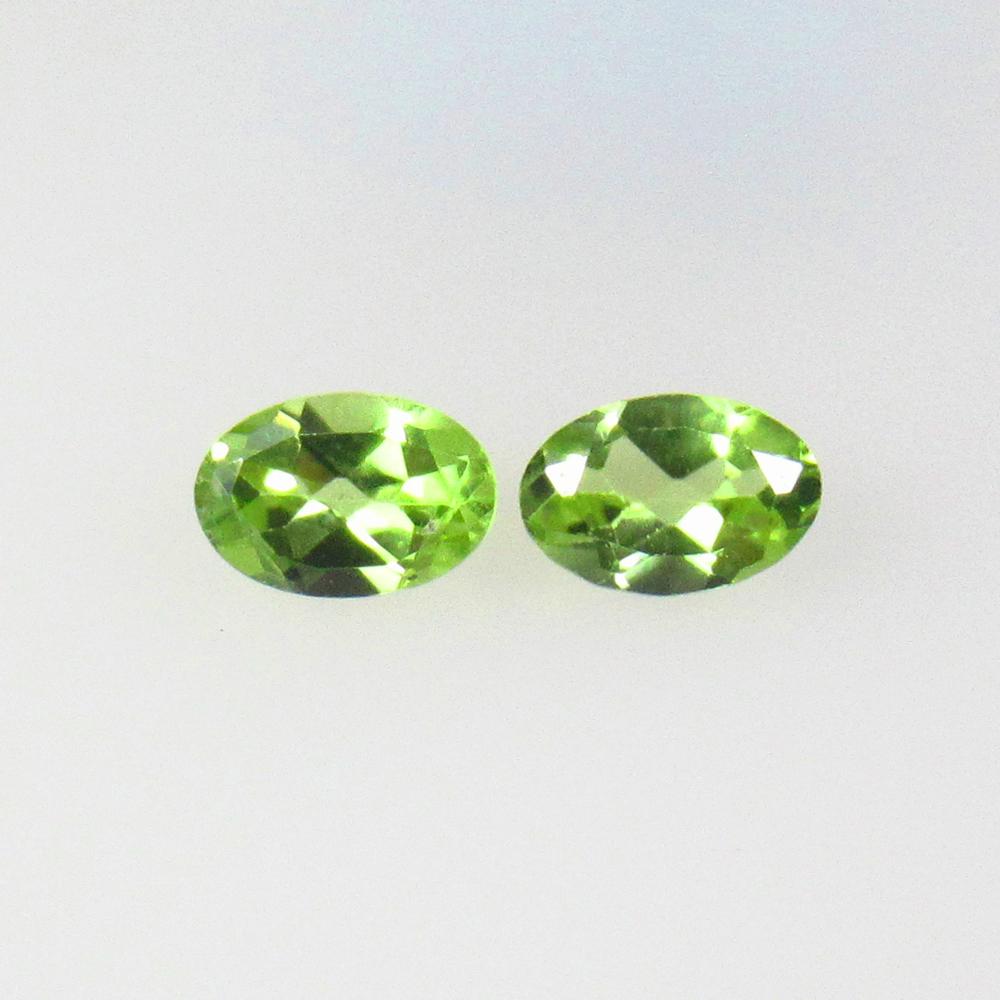 1.02 Ctw Natural Pakistan Peridot Oval Pair: No Reserve! Title: 1.02 Ctw Natural Pakistan Peridot Oval Pair Stone Clarity: VVS Gemstones: Natural Peridot Carat Weights: 1.02 Size/Dimensions: 6.00 x 4.00 x 2.60 mm / 2 Pc's Additional Information: