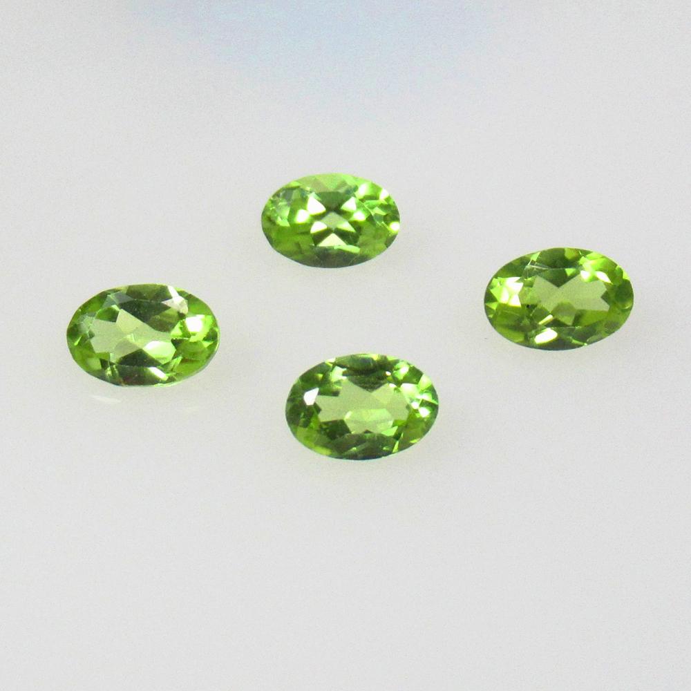 2.05 Ctw Natural Pakistan Peridot Oval Set: No Reserve! Title: 2.05 Ctw Natural Pakistan Peridot Oval Set Stone Clarity: VVS Gemstones: Natural Peridot Carat Weights: 2.05 Size/Dimensions: 6.0x4.0 - 6.3x4.3 mm / 4 Pc's Additional Information: T