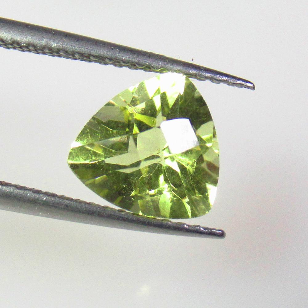 1.84 Ctw Natural Lemon Quartz Trillion Cut: No Reserve! Title: 1.84 Ctw Natural Lemon Quartz Trillion Cut Stone Clarity: VVS Gemstones: Natural Lemon Quartz Carat Weights: 1.84 Size/Dimensions: 8.00 x 8.00 x 5.60 mm Additional Information: Good