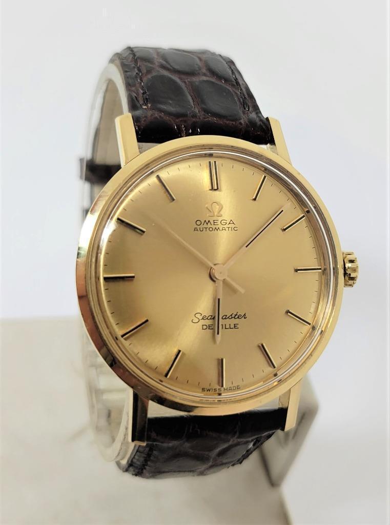Vintage Solid 18k OMEGA SEAMASTER DeVILLE Automatic Watch 1960s Cal.552* 165020: Vintage Solid 18k OMEGA SEAMASTER DeVILLE Automatic Watch 1960s Cal.552* 165020 Vintage Solid 18k OMEGA SEAMASTER DeVILLE Automatic Watch 1960s Cal.552* 165020 Description Vintage Solid 18k OMEGA SEAM