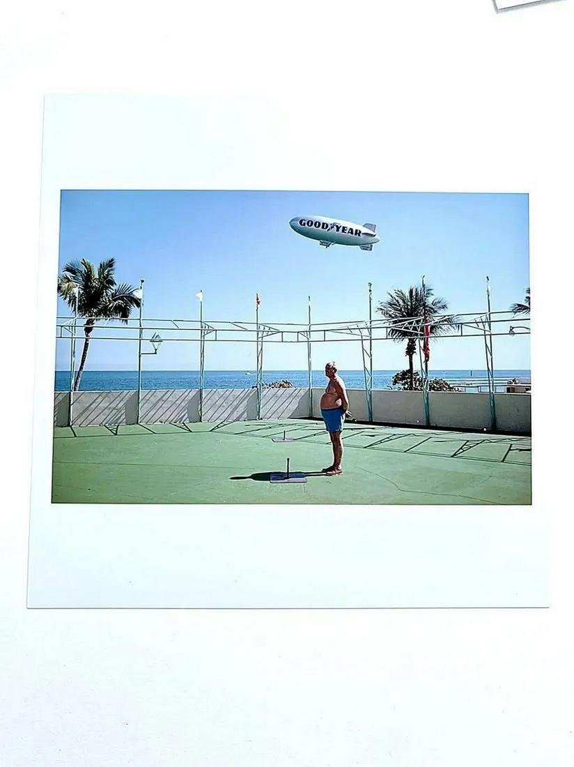 Joel Meyerowitz: Man and Blimp, Florida, 1968: Artist: Joel Meyerowitz Title:Man and Blimp, Florida, 1968 Medium: color photograph, Dimensions: 5" x 7" Additional Information: signed verso Reserve: $250.00 Shipping: Domestic: Flat-rate of $15.00 t