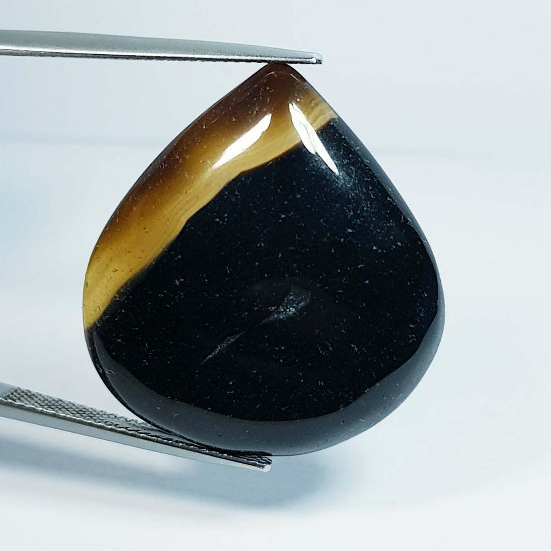 38.04 Ctz Natural Black Lace Agate: No Reserve! Title:38.04 Ctz Natural Black Lace Agate Color/Clarity:Semi Transparent Gemstones:Agate Carat Weights:38.04 Size/Dimensions:29.85 x 27.20 x 6.50 Additional Information:Pear / Brazil Shippi