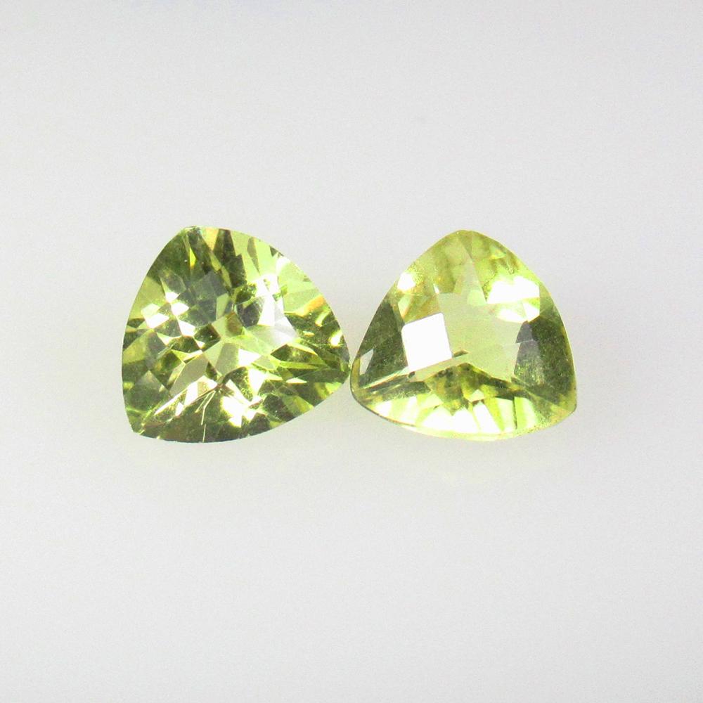 2.85 Ctw Natural Lemon Quartz Trillion Pair: No Reserve! Title: 2.85 Ctw Natural Lemon Quartz Trillion Pair Stone Clarity: VVS Gemstones: Natural Lemon Quartz Carat Weights: 2.85 Size/Dimensions: 8.10 x 7.80 x 5.40 mm / 2 Pc's Additional Informa