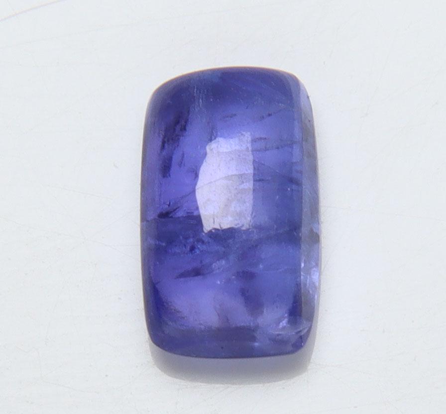1.38 Cts Natural Tanzanite: No Reserve! Title: 1.38 Cts Natural Tanzanite Additional Information: Gemstone : Natural Tanzanite Origin: Tanzania Weight : 1.38 carats Dimensions : 8x5 mm Shape/Cut: Rectengular Cabochan Color : Vio