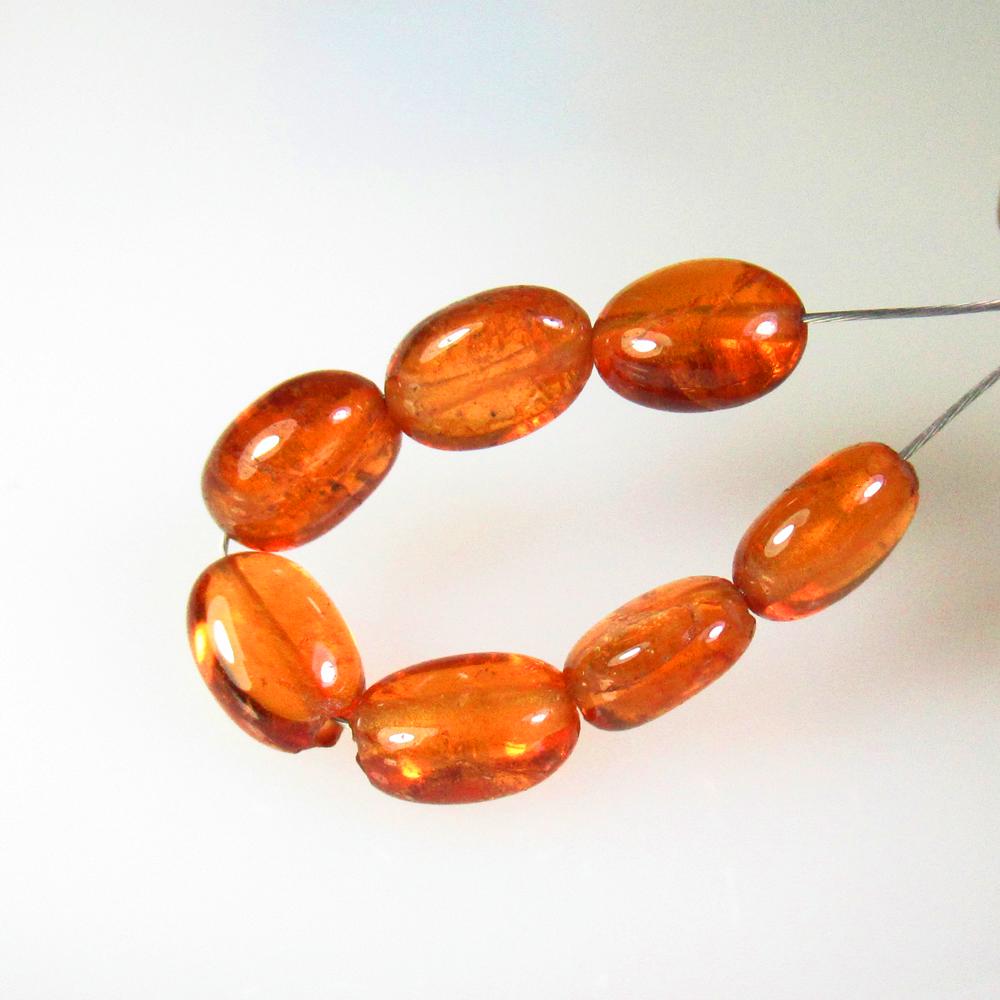 8.41 Ctw Natural 7 Hessonite Garnet Drilled Dumble Beads: No Reserve! Title: 8.41 Ctw Natural 7 Hessonite Garnet Drilled Dumble Beads Stone Clarity: Transparent Gemstones: Natural Hessonite Garnet Beads Carat Weights: 8.41 Size/Dimensions: 6.2x4.3 - 6.8x3.7 