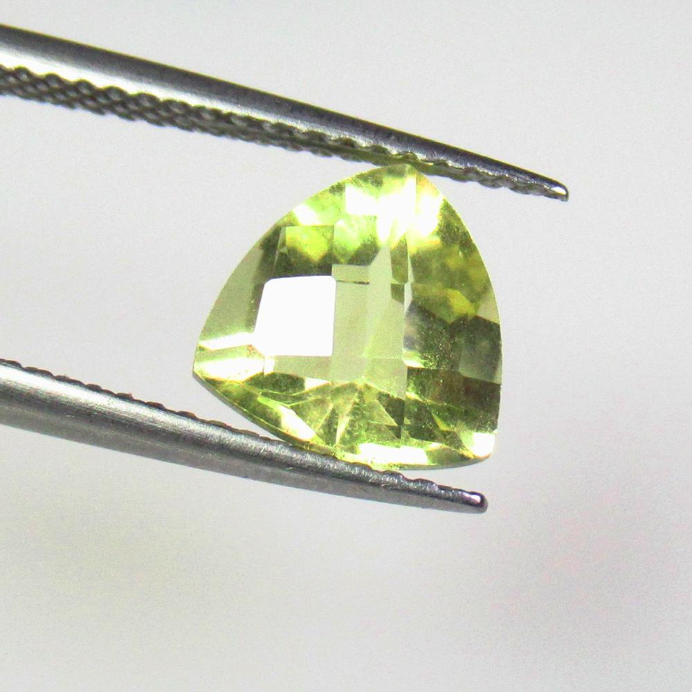 1.85 Ctw Natural Pakistan Peridot Trillion Cut: No Reserve! Title: 1.85 Ctw Natural Pakistan Peridot Trillion Cut Stone Clarity: VVS Gemstones: Natural Peridot Carat Weights: 1.85 Size/Dimensions: 8.20 x 8.10 x 5.70 mm Additional Information: Top C