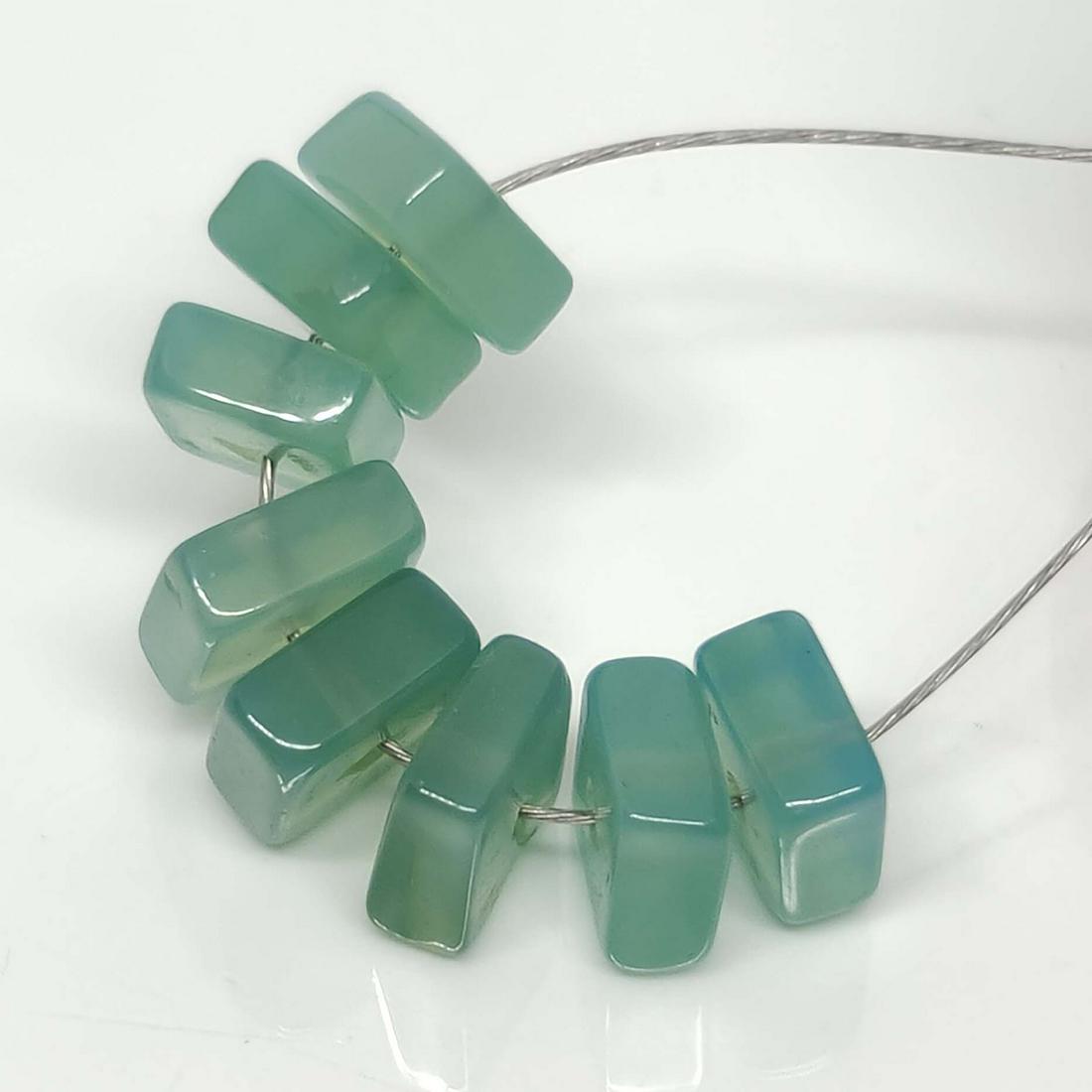 5 Ct Natural Blue Chalcedony 8 Drilled Beads: No Reserve! Title: 5 Ct Natural Blue Chalcedony 8 Drilled Beads Additional Information: Gemstones: Natural Blue Chalcedony Carat Weights: 5 ct Size/Dimensions: 5 X 5 mm Treatment: None Materials & Tec