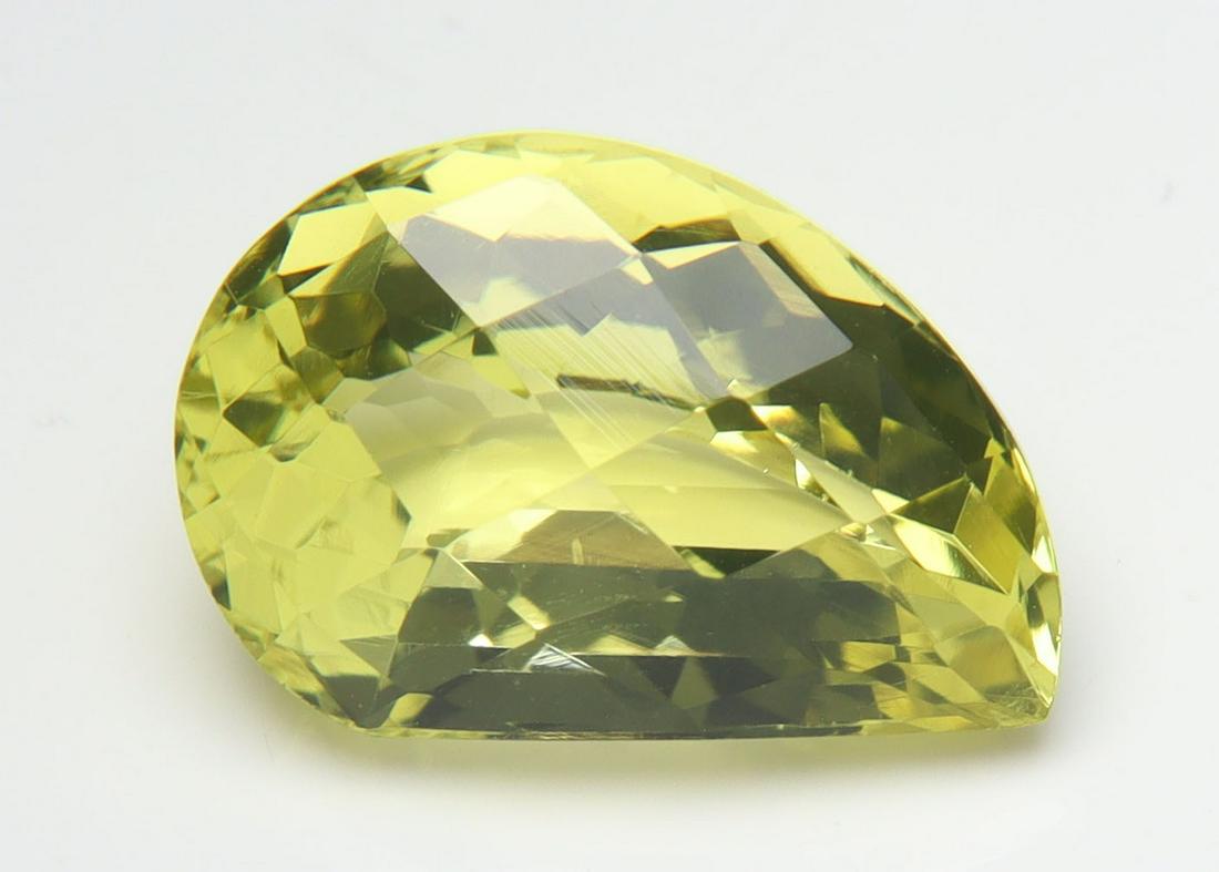 4.35 Cts Natural Lemon Quartz: No Reserve! Title: 4.35 Cts Natural Lemon Quartz Additional Information: Gemstone : Natural Lemon Quartz Shape and cut : Fancy Cut Origin : Africa Weight : 4.35 carats Measurements : 13.15x8.63x6.99 m