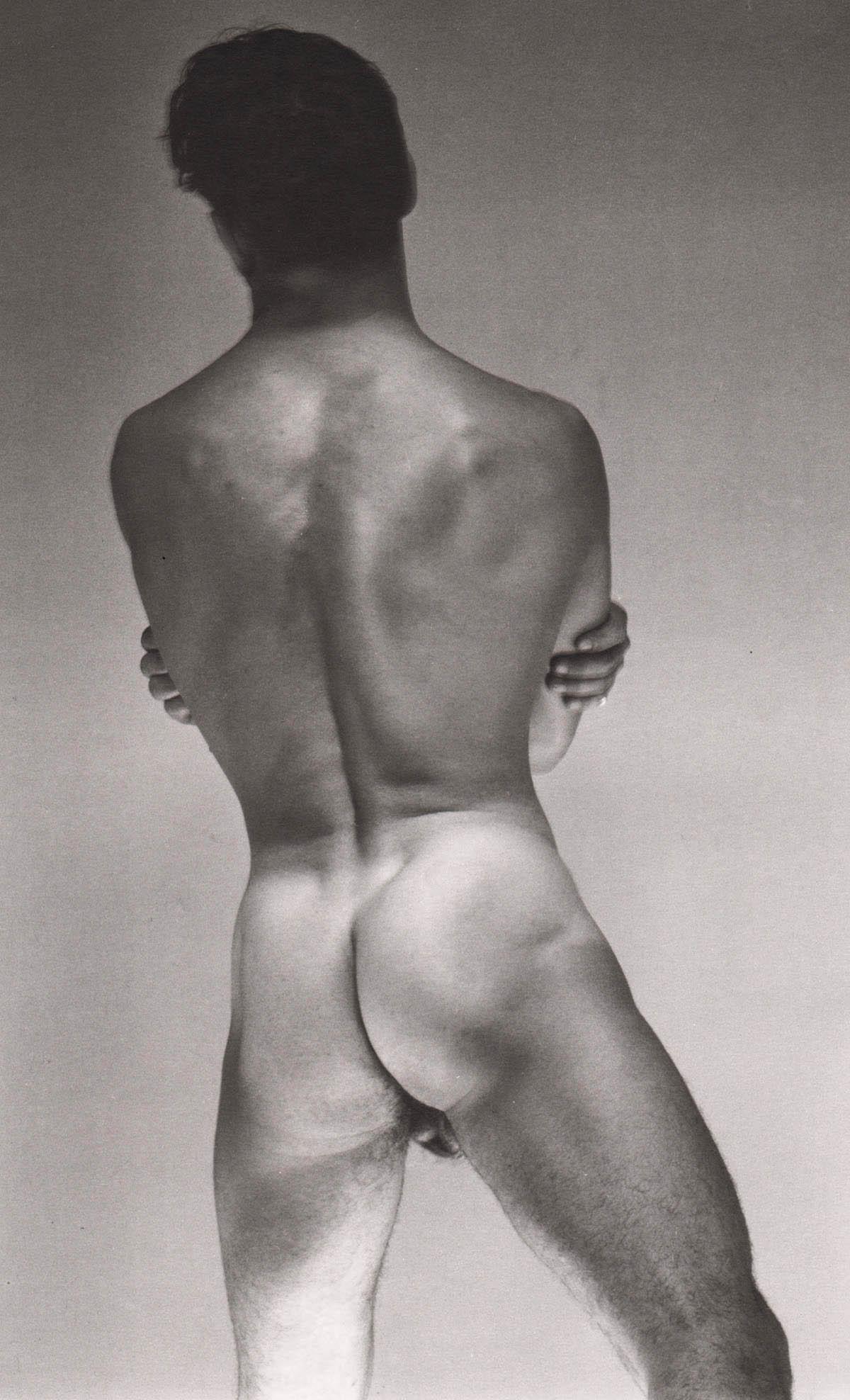 GEORGE PLATT LYNES - Male Nude, 1952: Artist: GEORGE PLATT LYNES Print Title: Male Nude, 1952 Medium: Duotone Photoengraving Printing Date: 1990’s Printed in Germany Image Size: approx. 8.5 x 5.25” George Platt Lynes (1907-1955).was a