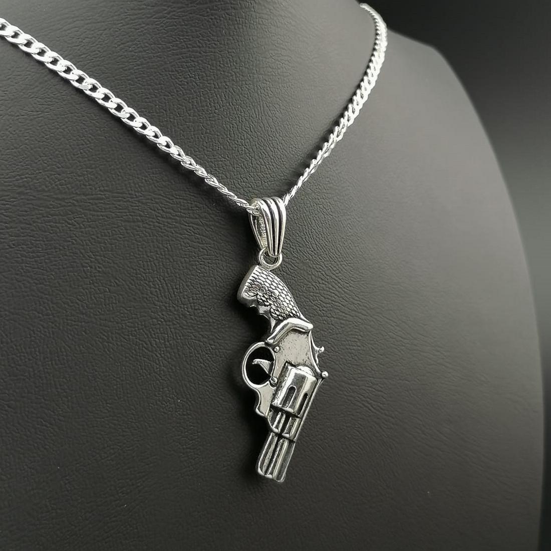 925 Silver Chain with Gun Pendant.: Title: 925 Silver Chain with Gun Pendant. Additional Information: 925 Silver Chain with Gun Pendant. -Total Weight:21.5g -Size: Chain Size: 23.62 in(60cm). Pendant Size:0.86x1.96 in (22x50mm) (Bail in