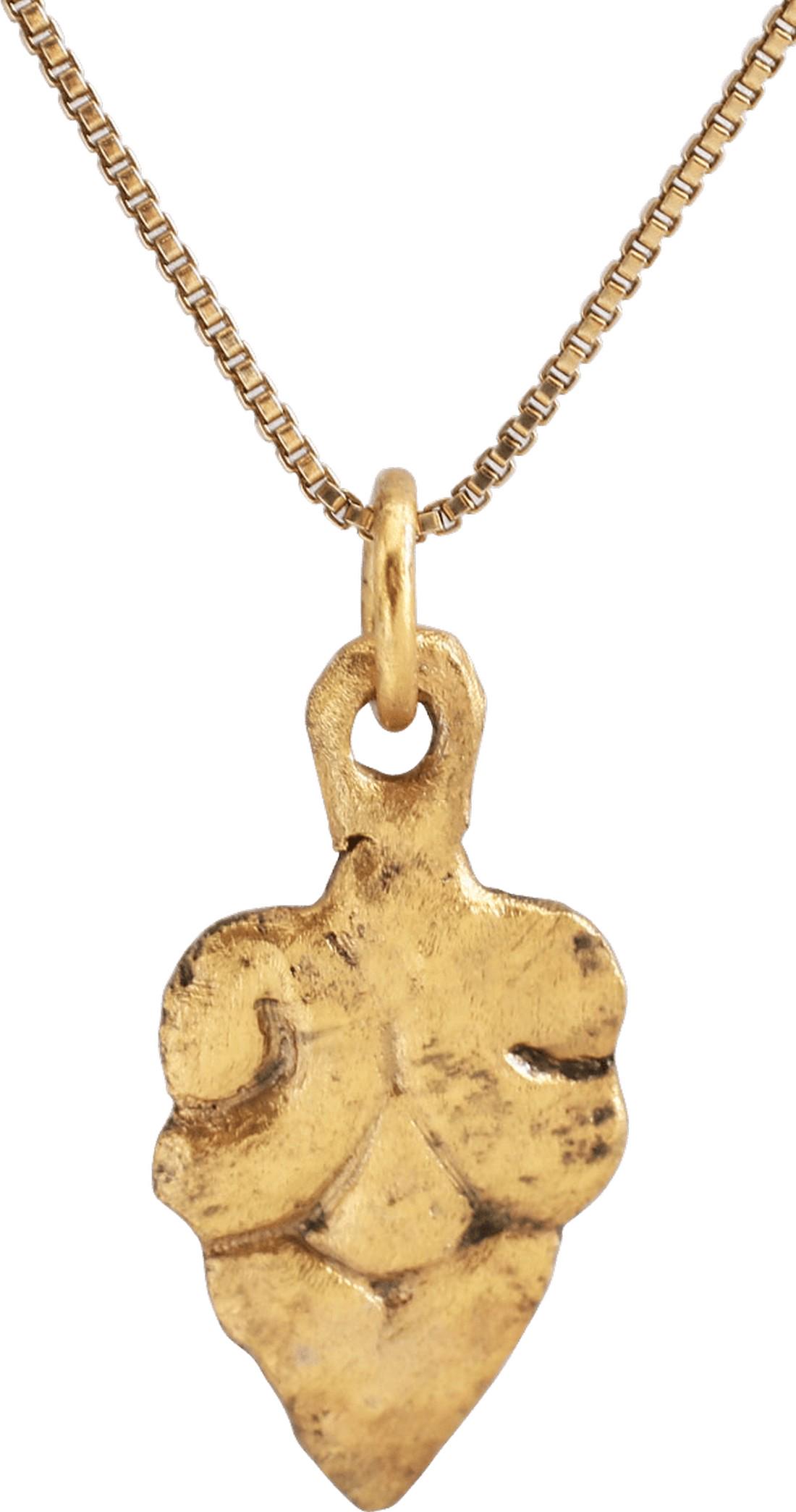 VIKING HEART PENDANT, 900-1050 A.D: Over 55/8” height (0.67”) plus the loop. Heart form with cusped top stylized and forming the top of the incised trefoil. This and the naturalistic form are both used profusely in Nordic li