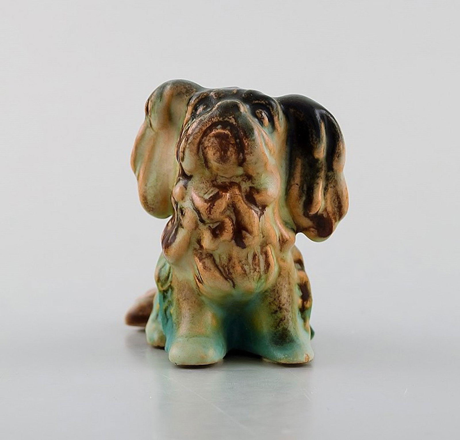 Michael Andersen. Rare Pekingese in glazed ceramics. Beautiful glaze in blue green shades. 1950's.: Michael Andersen. Rare Pekingese in glazed ceramics. Beautiful glaze in blue green shades. 1950's. Measures: 7 x 6.5 cm. In very good condition. Stamped. Reserve: $60.00 Shipping: Domestic: Shipping r