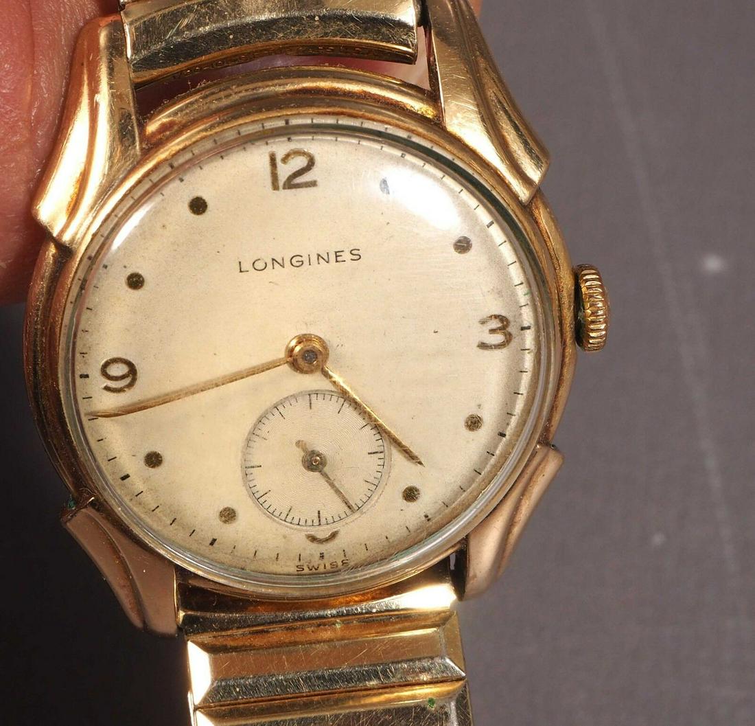 1960's LONGINES 10K GOLD FILLED Band Hand-Winding SUB SECOND DIAL works Vintage: This is a stunning Mid -century Longines Vintage wristwatch. It is marked 'Longines" and 'Swiss' on the face It is stamped 1/20 10K G.F. Top Caps. USA on the wrist band. It works great. I cannot open