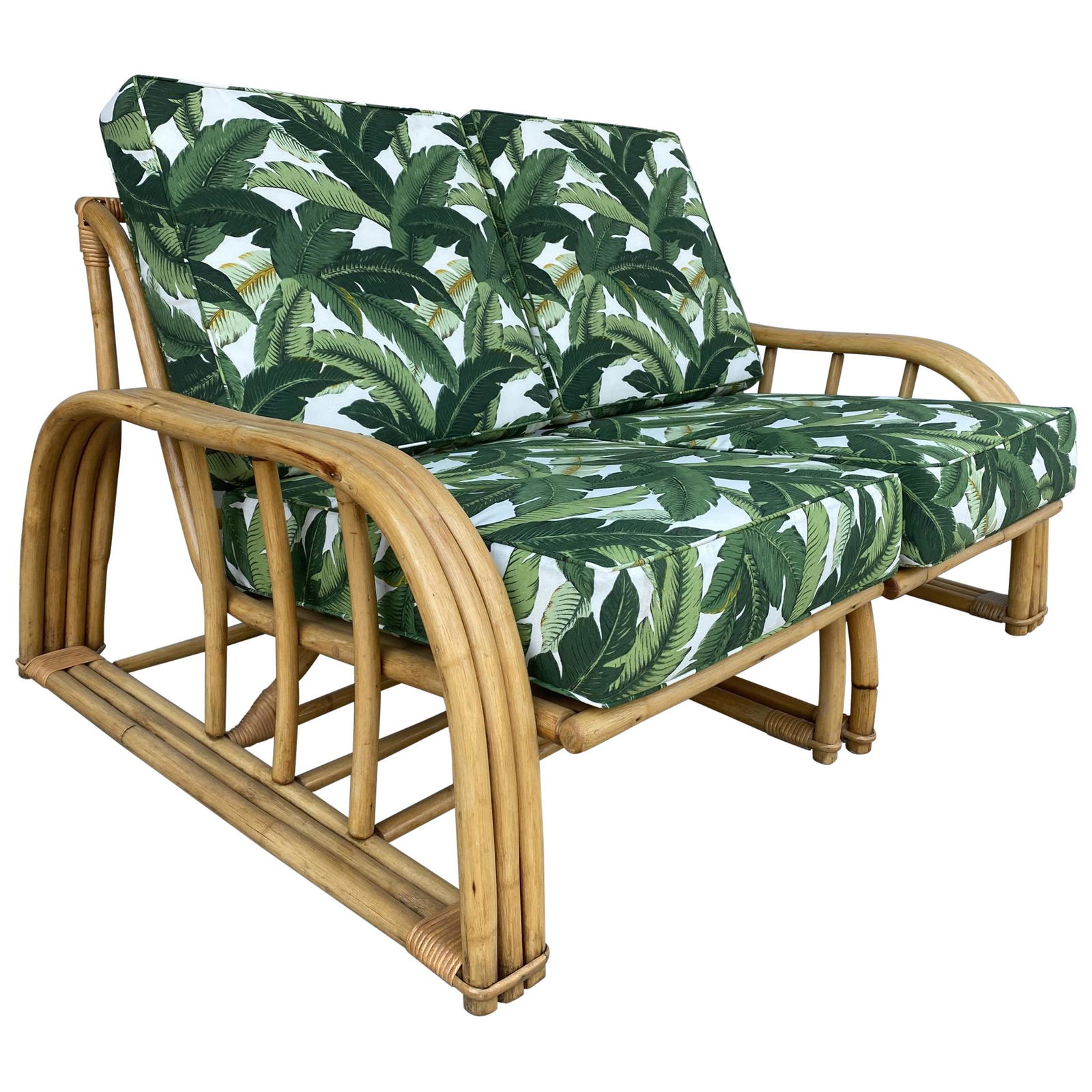 Restored Paul Laszlo Rattan Three Strand Sectional Settee Sofa: Description: Restored original 1948 Paul Laszlo three-strand sectional settee featuring three-strand staple-shaped arms and arched bases. Custom cushions C.O.M. (Costumers Own Material) are included i