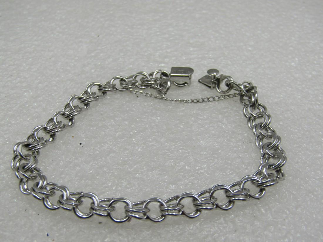 Vintage Sterling Charm Bracelet, Signed JB, 7.25", Safety Clasp: Vintage Sterling Charm Bracelet, Signed JB, 7.25", Safety Clasp. Double link that alternates direction and is appx. 6.5mm wide, Box clasp, with safety chain. Weight is 0.37 gr. Age is appx. 1960's-197