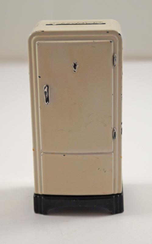 Electrolux Refrigerator Cast Metal Still Bank: Title: Electrolux Refrigerator Cast Metal Still Bank Dimension: 4” tall x 2” wide x 1 ½” deep. Date: Circa 1940’s. Additional Information: Superbly cast Refrigerator Cast 