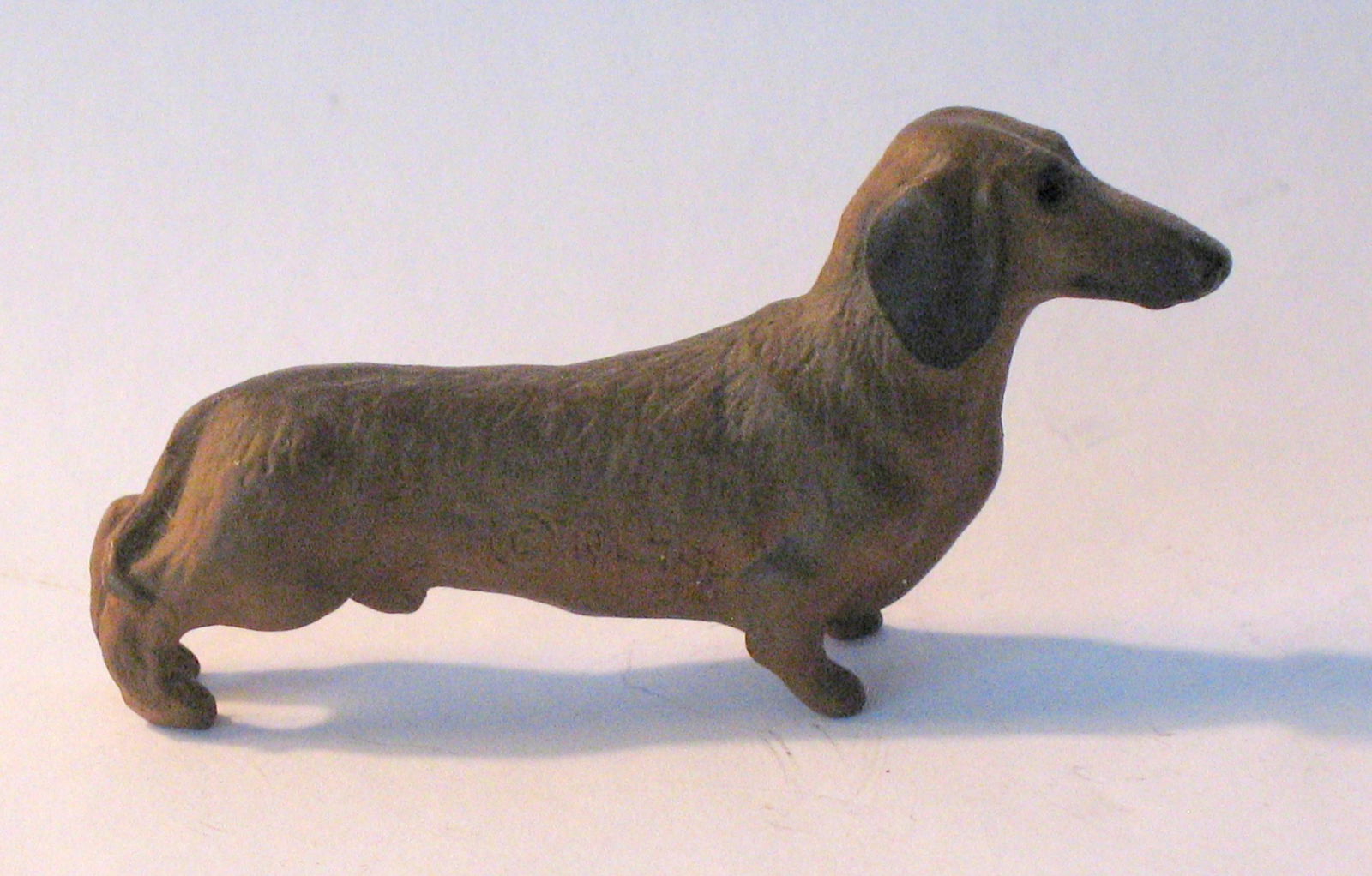Vintage cast metal Dachshund paper weight (1 of 3)