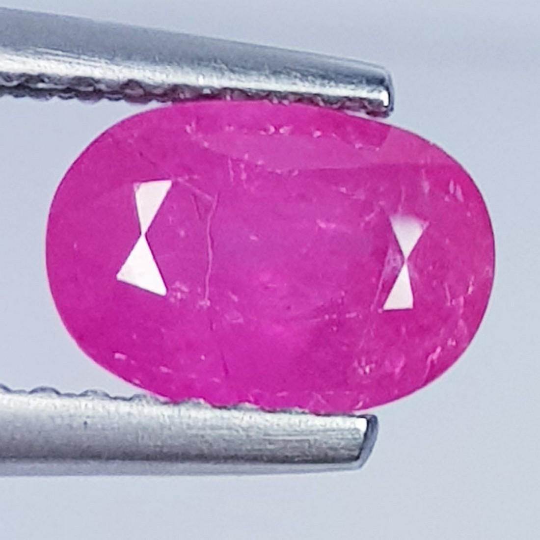 1.33 Ctz Top Quality Pinkish Red Natural Ruby: No Reserve! Title:1.33 Ctz Top Quality Pinkish Red Natural Ruby Color/Clarity:Pinkish Red / VVS/VS Gemstones:Ruby Carat Weights:1.33 Size/Dimensions:7.80 x 5.50 x 3.70 Additional Information:Oval. / B