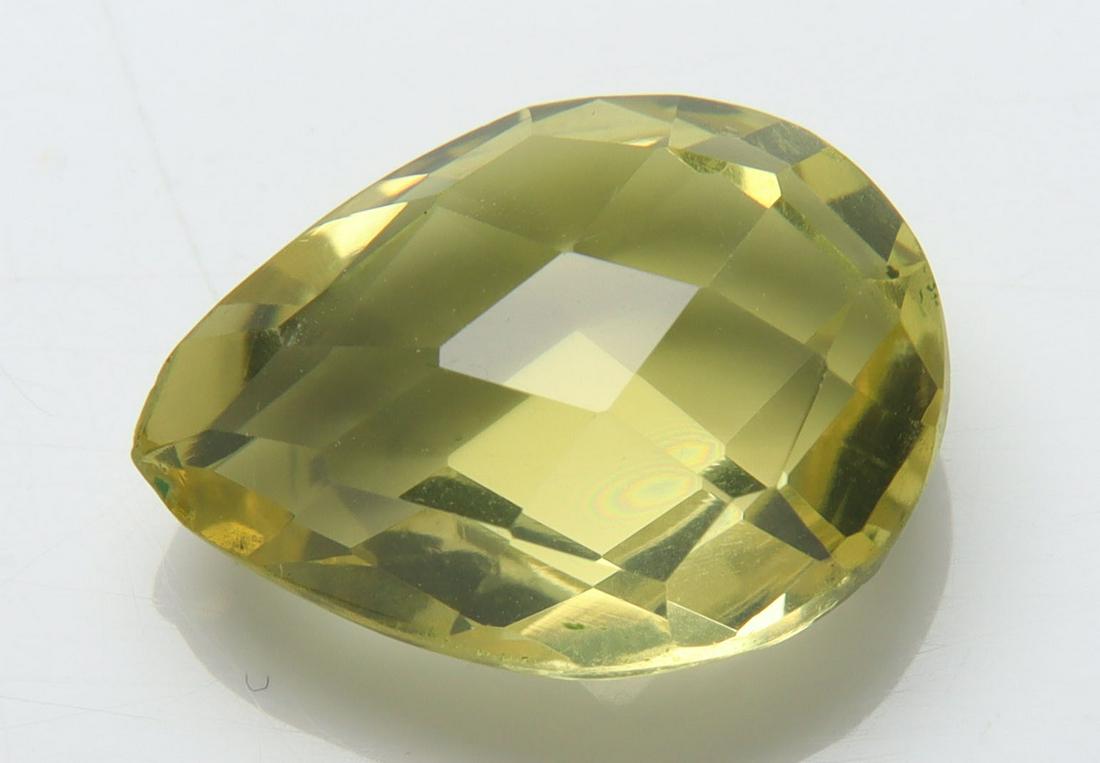 5.68 Cts Natural Lemon Quartz: No Reserve! Title: 5.68 Cts Natural Lemon Quartz Additional Information: Gemstone : Natural Lemon Quartz Shape and cut : Pear Cut Origin : Africa Weight : 5.68 carats Measurements : 14.37x10.71x6.56 m
