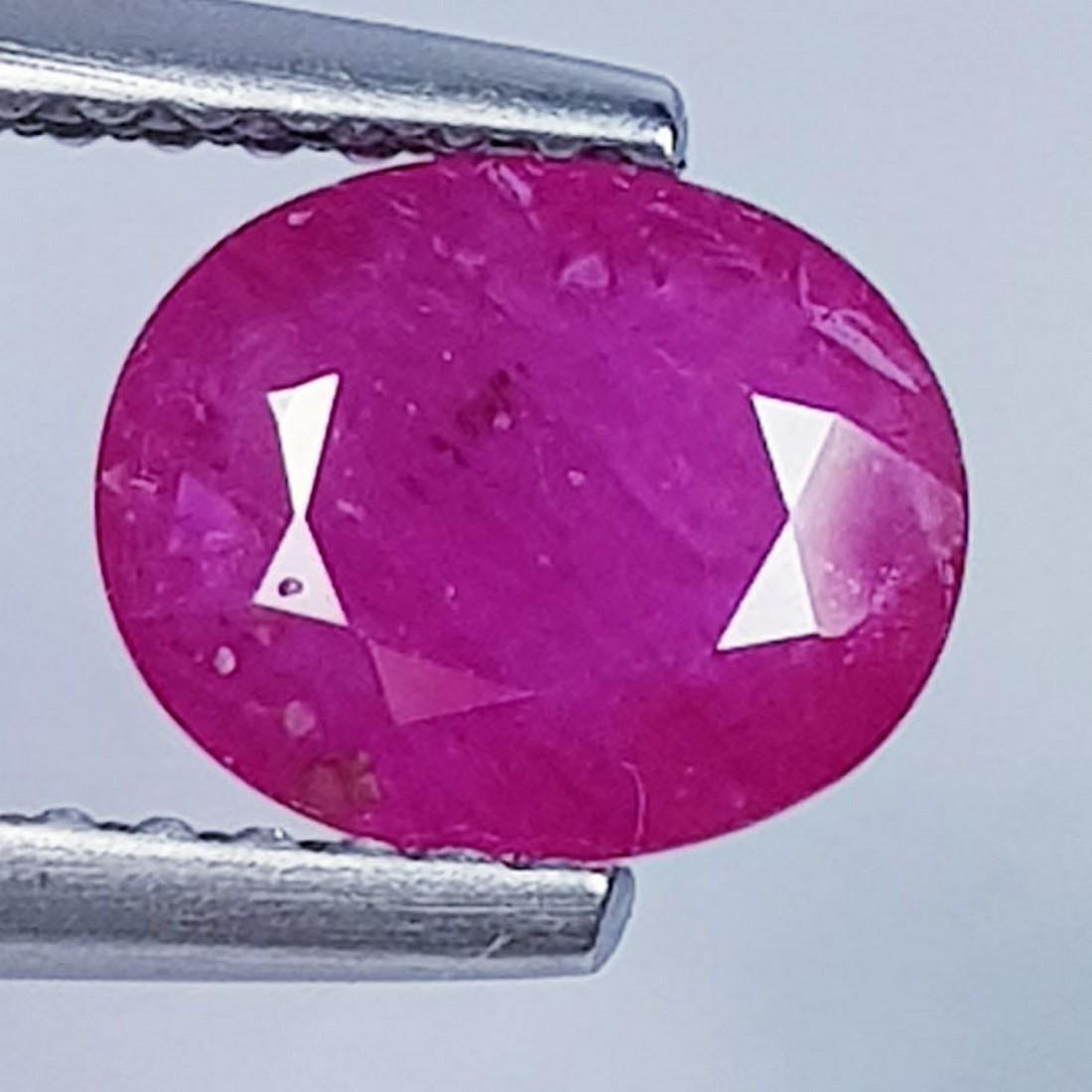 1.20 Ctz Top Quality Pinkish Red Natural Ruby: No Reserve! Title:1.20 Ctz Top Quality Pinkish Red Natural Ruby Color/Clarity:Pinkish Red / VVS/VS Gemstones:Ruby Carat Weights:1.2 Size/Dimensions:7.50 x 6.10 x 2.60 Additional Information:Oval. / Bu