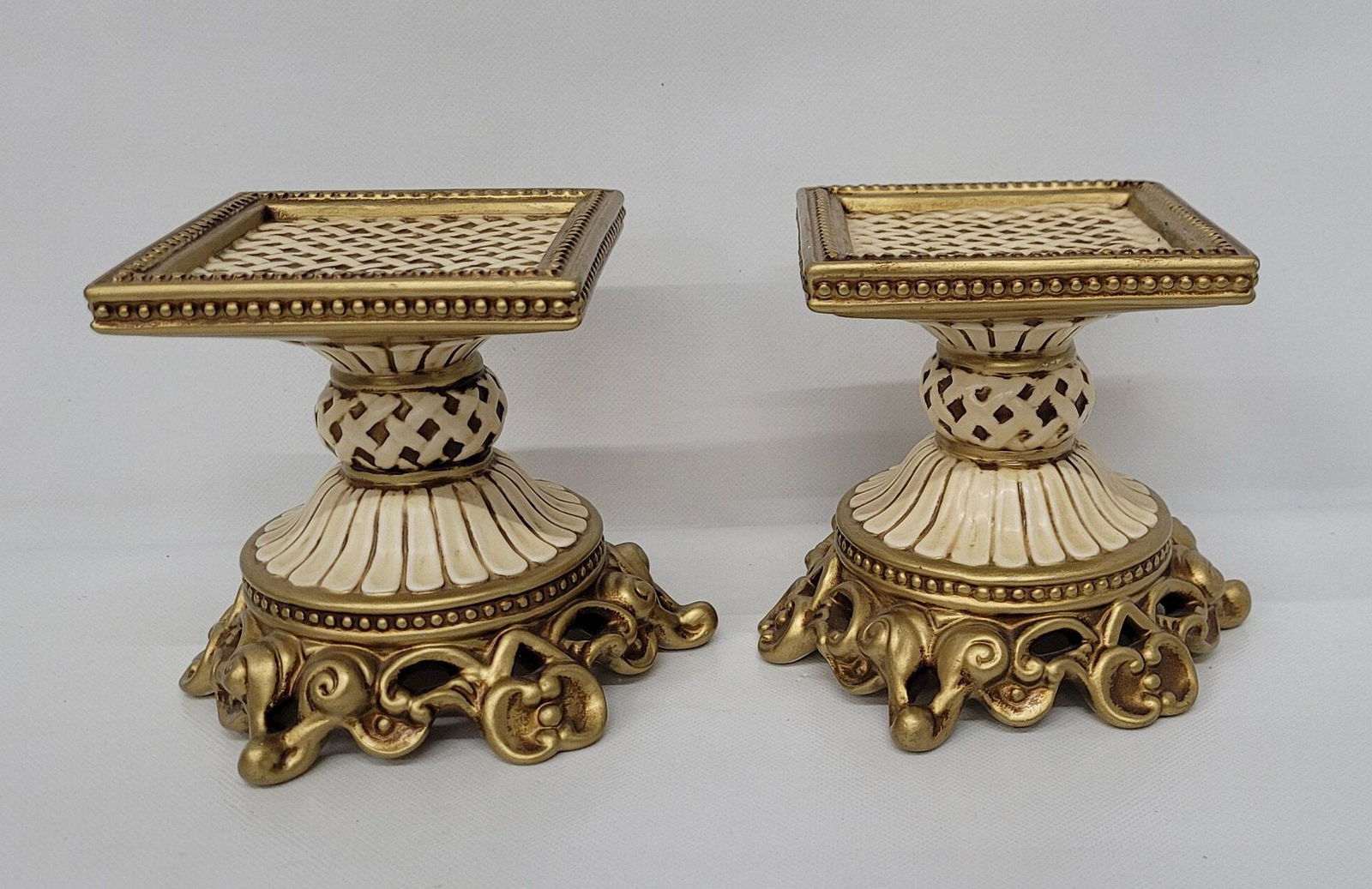 Vintage Fitz and Floyd Essentials-Handcrafted Gold and Pearl Ornate Candle Holder Riser: Vintage from the 1990s Materials: metal Width: 4.5 inches Height: 4.75 inches Description Vintage Vintage Fitz and Floyd Essentials-Handcrafted Gold and Pearl Ornate Candle Holder or Riser. Hollywood