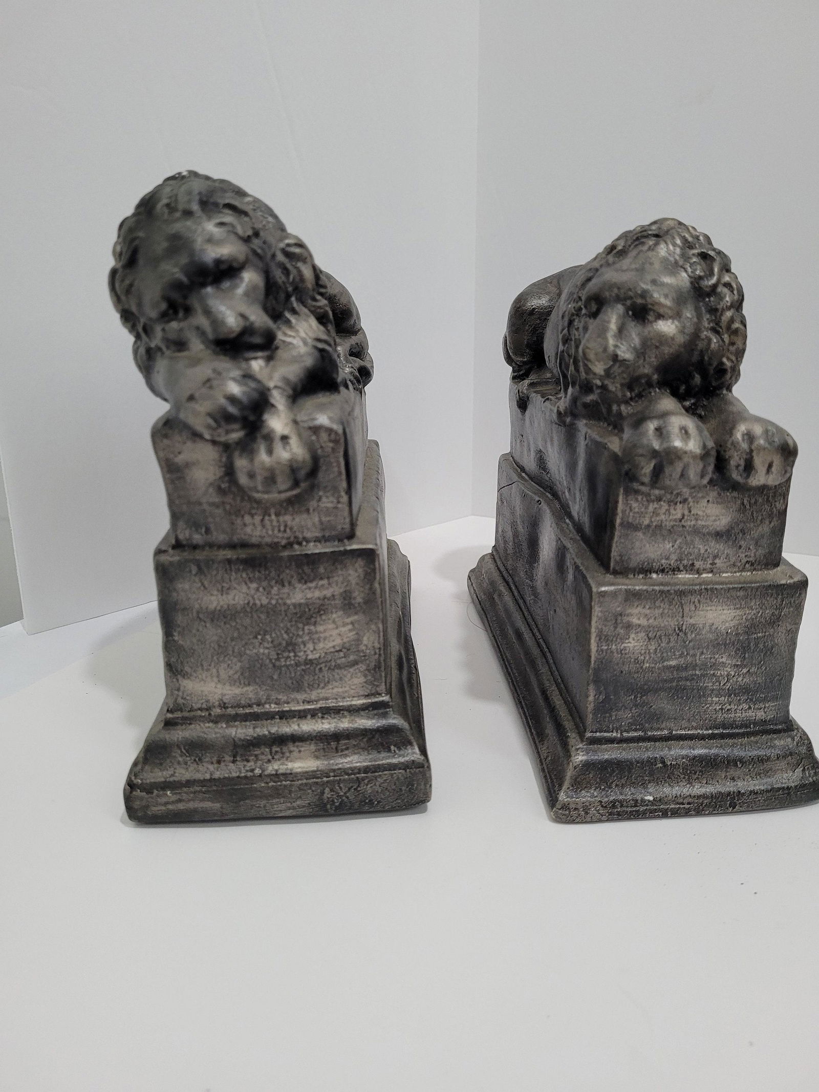 Vintage Lion Bookends pewter gray chalk sculpture big cat statues book holders Neoclassical: Vintage from the 1970s Materials: plaster, chalk Width: 7.5 inches Height: 7.5 inches Depth: 3.5 inches Description Antique Lion Bookends Slate Gray Chalk Sculpture Big Cat Statues Book Holders Office