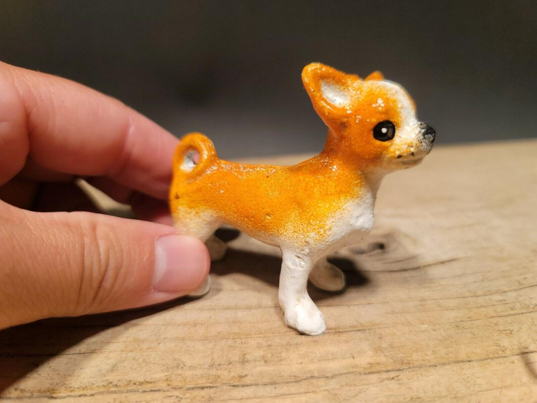 Miniature Cast Iron Chihuahua Figure: 2 3/4" Tall x 1 5/8" Wide Wonderful little reproduction cast iron black and white French bulldog. Good detail cast iron hand painted and slightly aged to look like an antique. Certainly hard to tell i