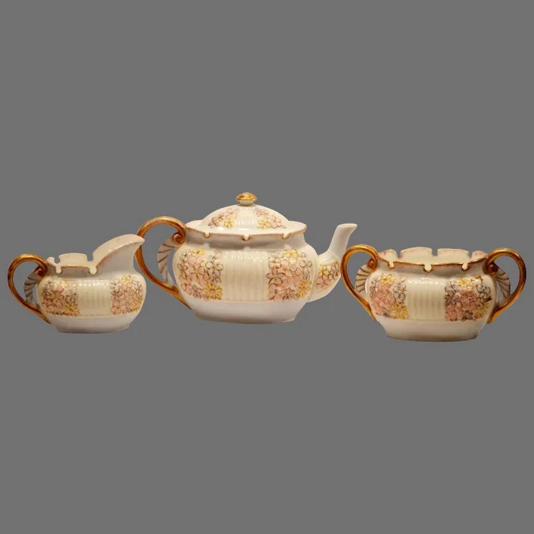 Rare Teapot Creamer & Sugar Set ~ Porcelain ~ Lotus Ware ~ Venice mold ~ Soft Pastel Flowers ~ Hand: Lotus Ware is considered to be scarce and possibly the finest porcelain ever produced in the United States. It was made during the 1890s by East Liverpool's Ohio, Knowles, Taylor & Knowles pottery. KT