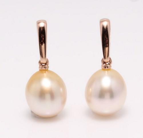 14 kt. Rose Gold - 9x10mm Golden South Sea Pearl Drops - Earrings: Title: 14 kt. Rose Gold - 9x10mm Golden South Sea Pearl Drops - Earrings Description: Produced in the warm oceans of Australia, these South Sea pearls were hand selected for their warm soft golden col