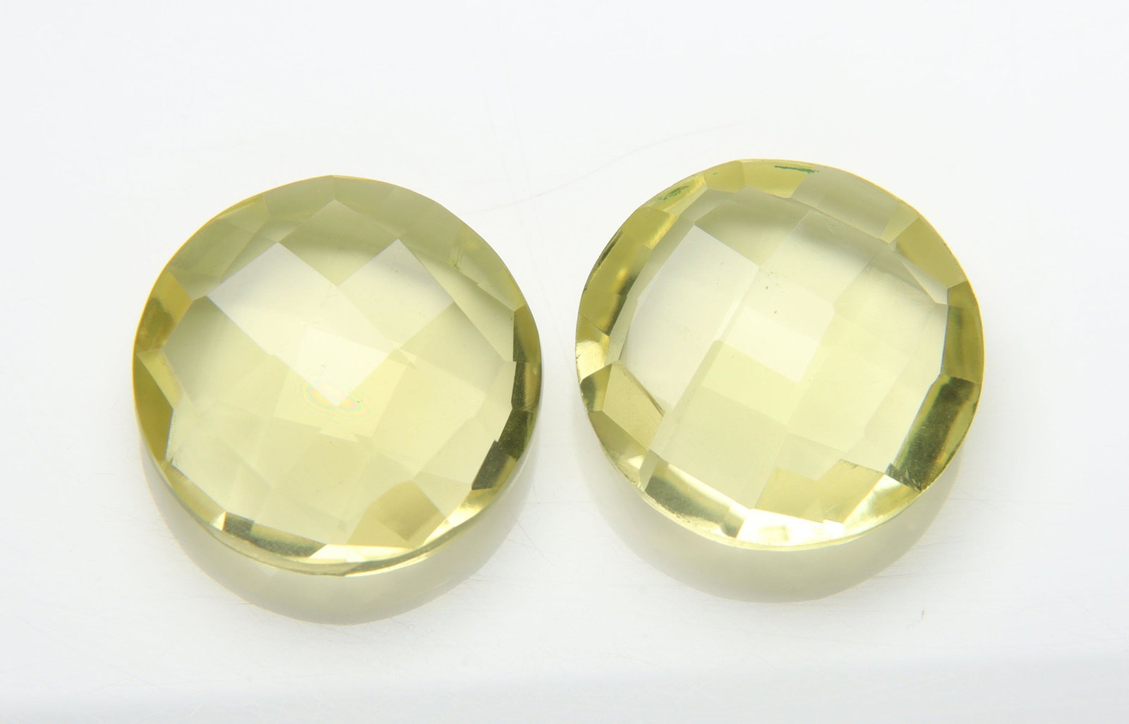 AAA23.07 Cts Natural Lemon Quartz Pair: No Reserve! Title: AAA23.07 Cts Natural Lemon Quartz Pair Additional Information: Gemstone : Natural Lemon Quartz Shape and cut : Round Cut Origin : Africa Weight : 23.07 carats Measurements : 16x16 m