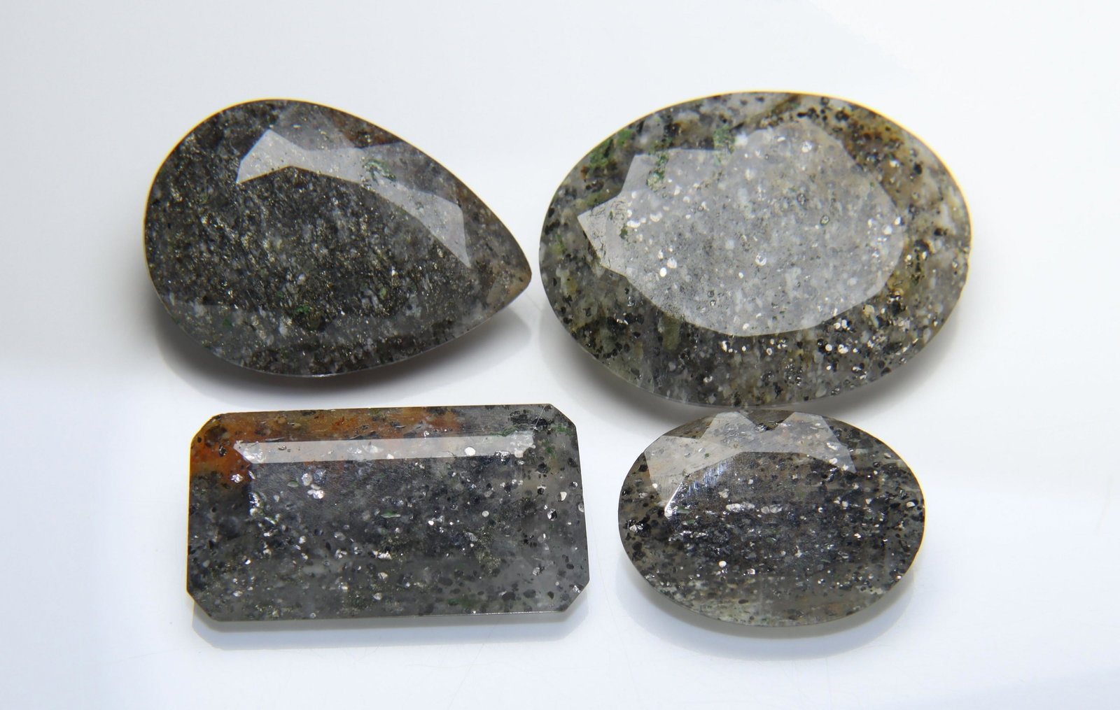 47.32 Cts Natural Black Sunstone Lot: No Reserve! Title: 47.32 Cts Natural Black Sunstone Lot Additional Information: emstone : Natural Black Sunstone Origin : Africa Weight : 47.32 Carats Dimensions : 24.26x18.36x6.06 mm, 16.55x11.84x5.6