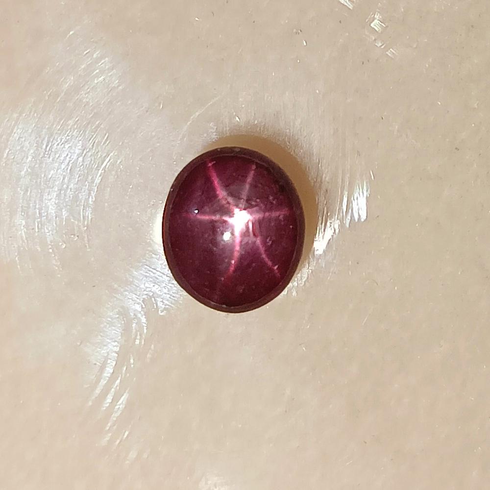 1.30 Ctw Natural Six Line Star Ruby Oval Cab: No Reserve! Title: 1.30 Ctw Natural Six Line Star Ruby Oval Cab Stone Clarity: Opaque Gemstones: Natural Star Ruby Carat Weights: 1.3 Size/Dimensions: 5.7 x 4.9 x 3.7 mm Additional Information: Deep P