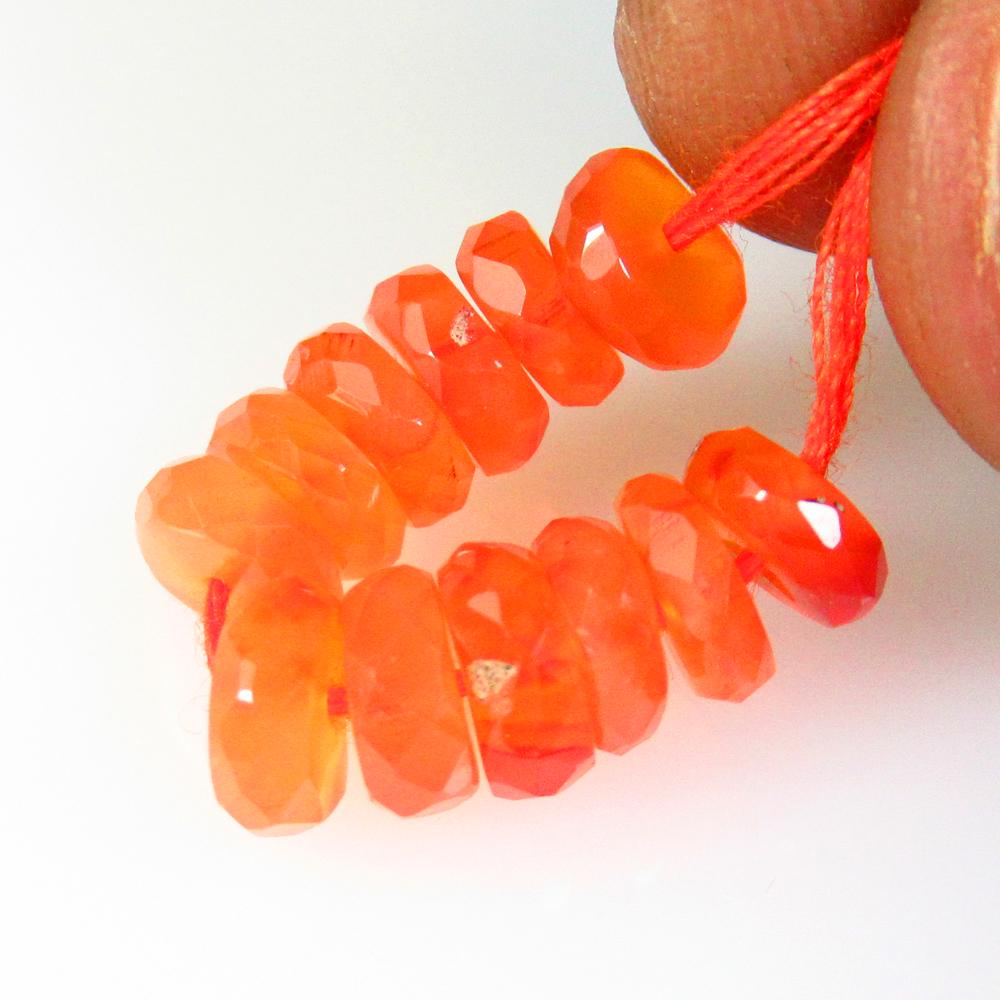 8.26 Ct Natural 12 Drilled Orange Carnelian Pear Drop Beads: No Reserve! Title: 8.26 Ct Natural 12 Drilled Orange Carnelian Pear Drop Beads Stone Clarity: Semi-Transparent Gemstones: Natural Carnelian Beads Carat Weights: 8.26 Size/Dimensions: 5.60 - 6.30 mm / 