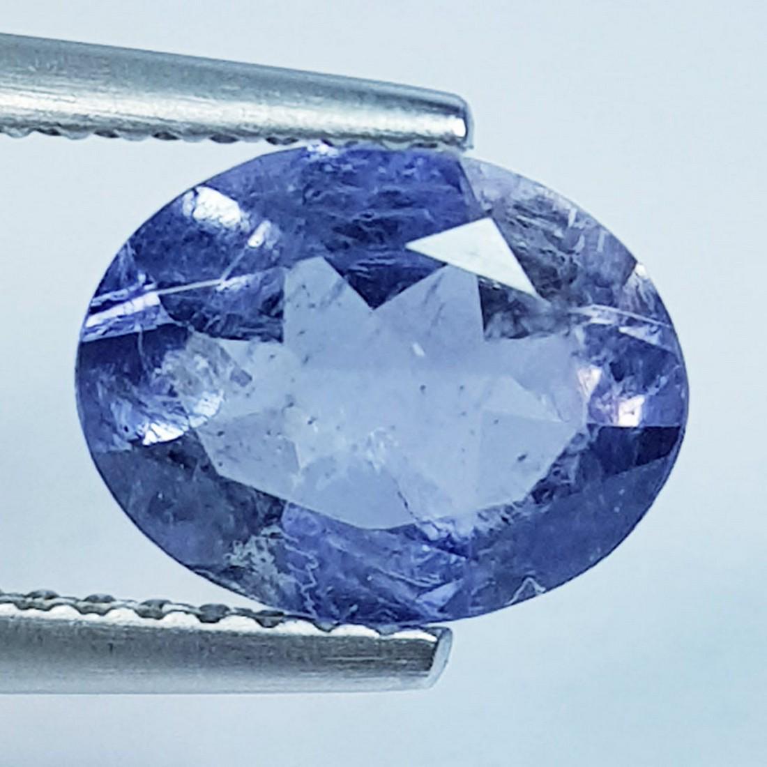 1.29 Ctz "Fine Collection" Natural Iolite Oval Cut: No Reserve! Title: 1.29 Ctz "Fine Collection" Natural Iolite Oval Cut Color/Clarity: Blue / VS Gemstones: Lolite Carat Weights: 1.29 Size/Dimensions: 9.00 x 7.30 x 3.80 Additional Information: Oval - 